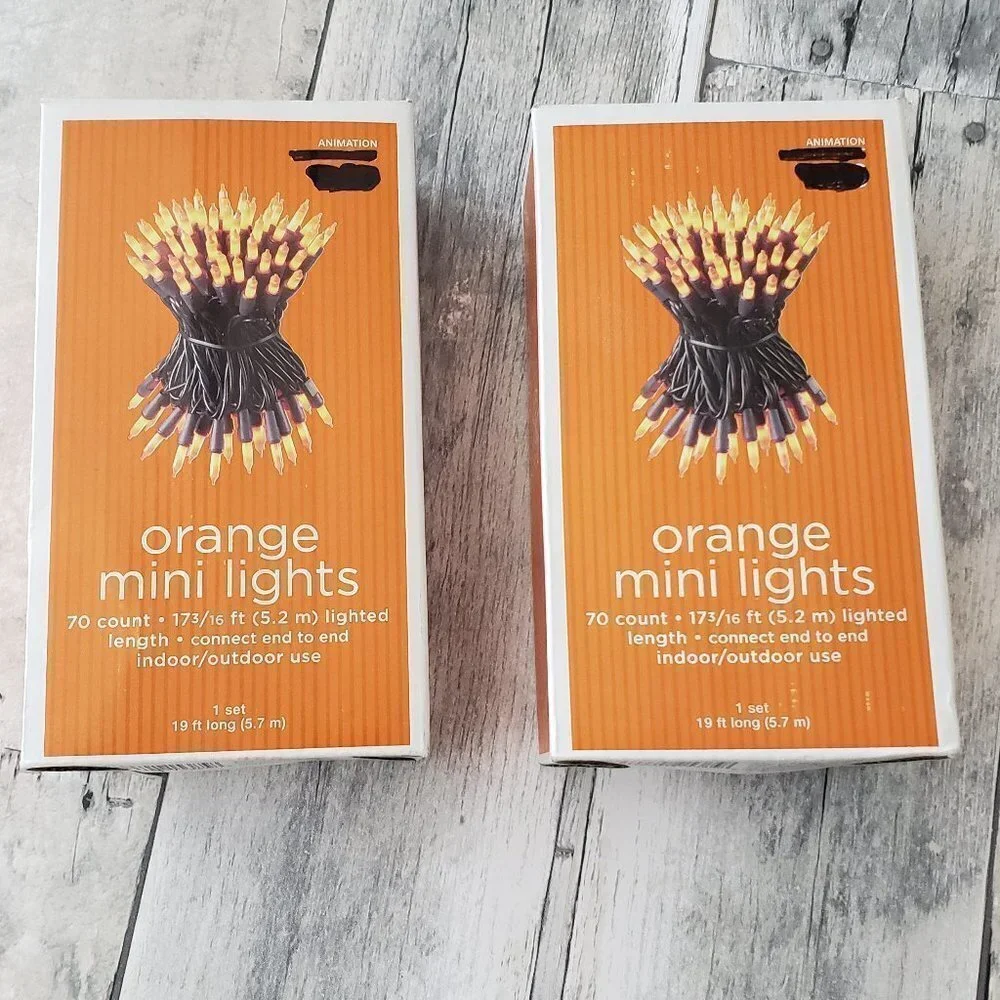 Unused (set of 2) Mini Orange Lights 70 count ea. Indoor/Outdoor